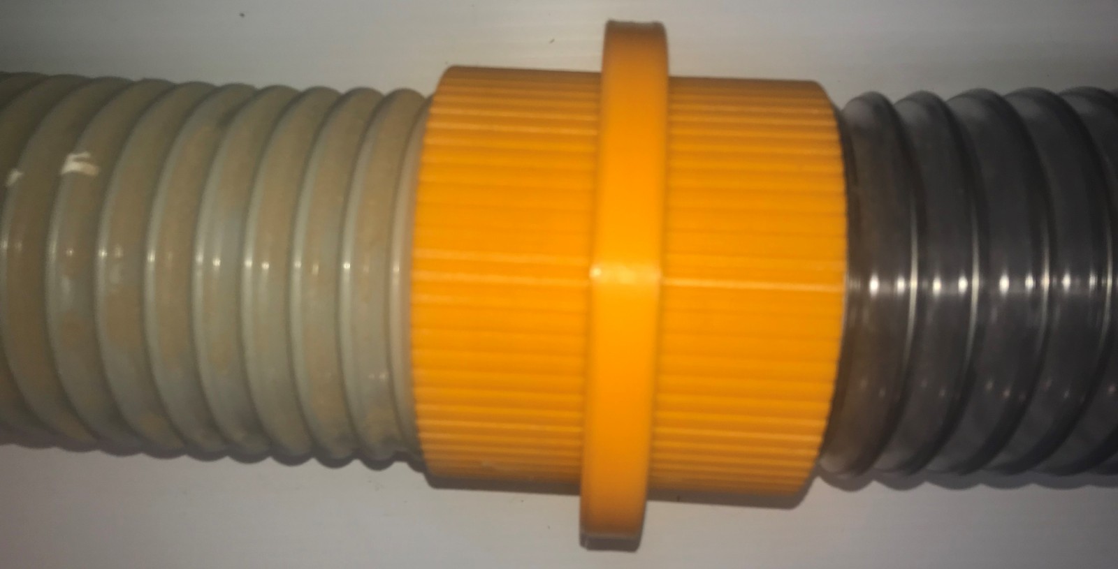 Shop vacuum hose connectors